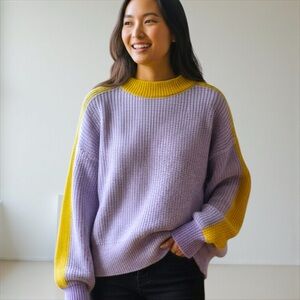 334. Cable knit sweater in purple gold